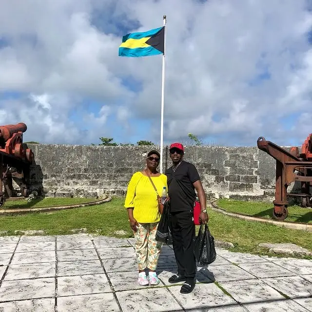 Guests by a cannon at Fort Montagu during a Sir Guillaume's tour