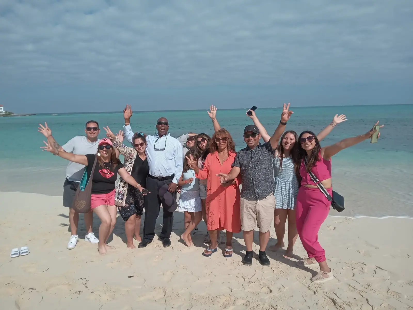 Sir Guillaume's tour group at a Nassau beach